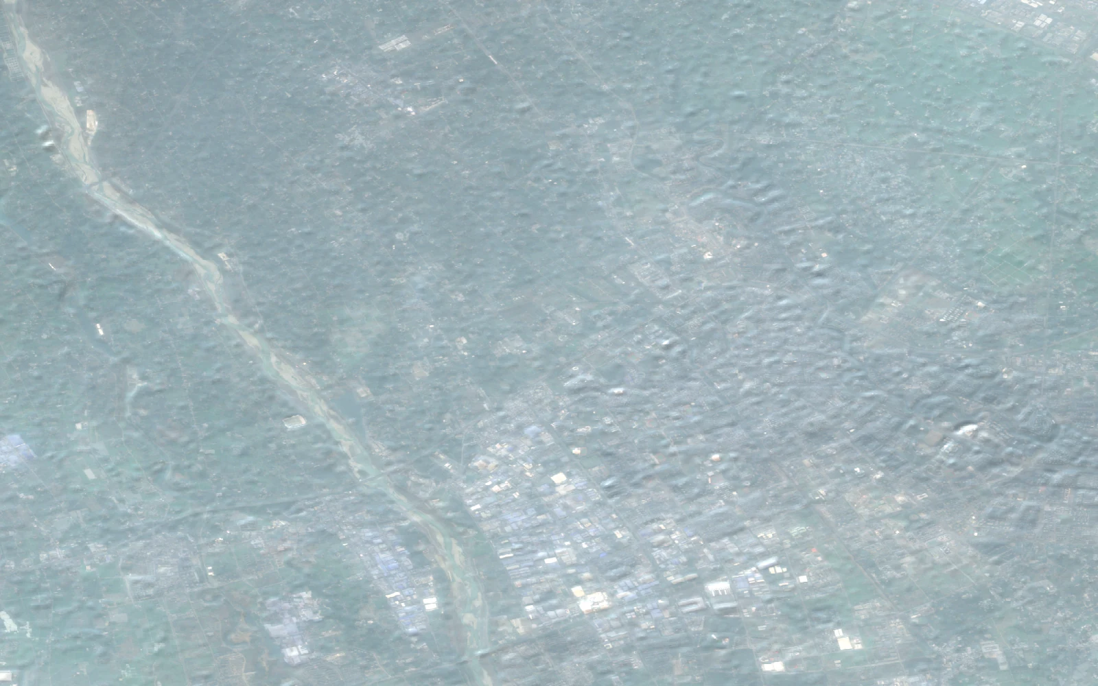 成都温江代表范围的Sentinel-2真彩色影像，展示平坝、河流与城郊农业镶嵌